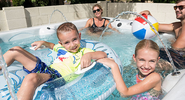 Family in swim spa