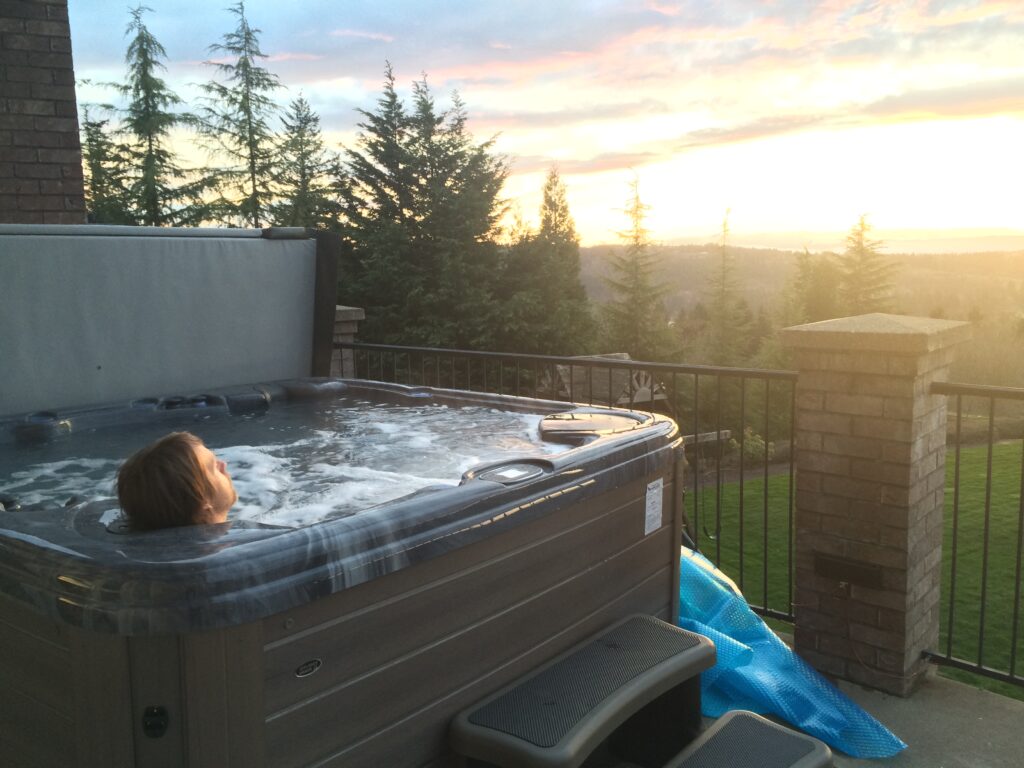 relaxing sunset view from a hot tub